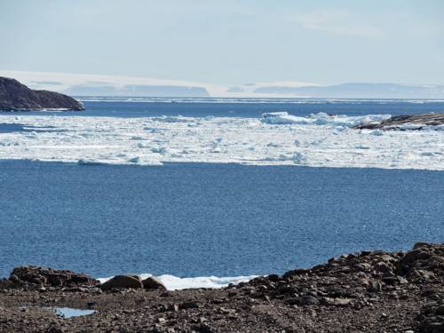 Rocky coast with sea ice