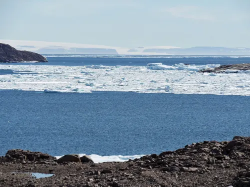 Rocky coast with sea ice