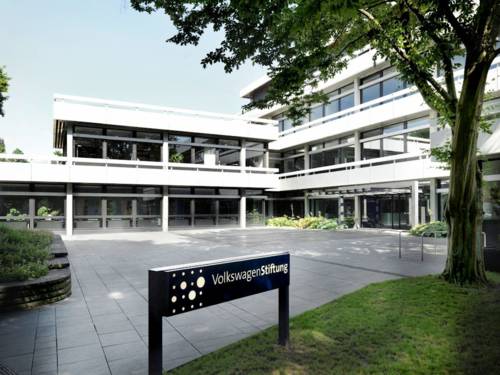 Building with a sign in front of it reading "Volkswagenstiftung"